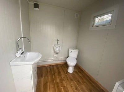 CONTENEDOR SANITARIO CON DOBLE CABINA WC