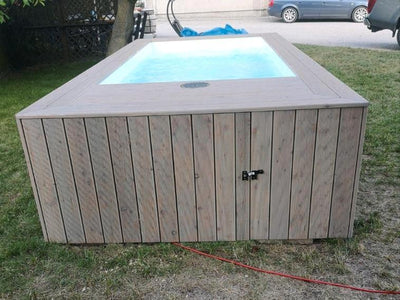 PISCINA CONTENEDOR CON REVESTIMIENTO DE MADERA